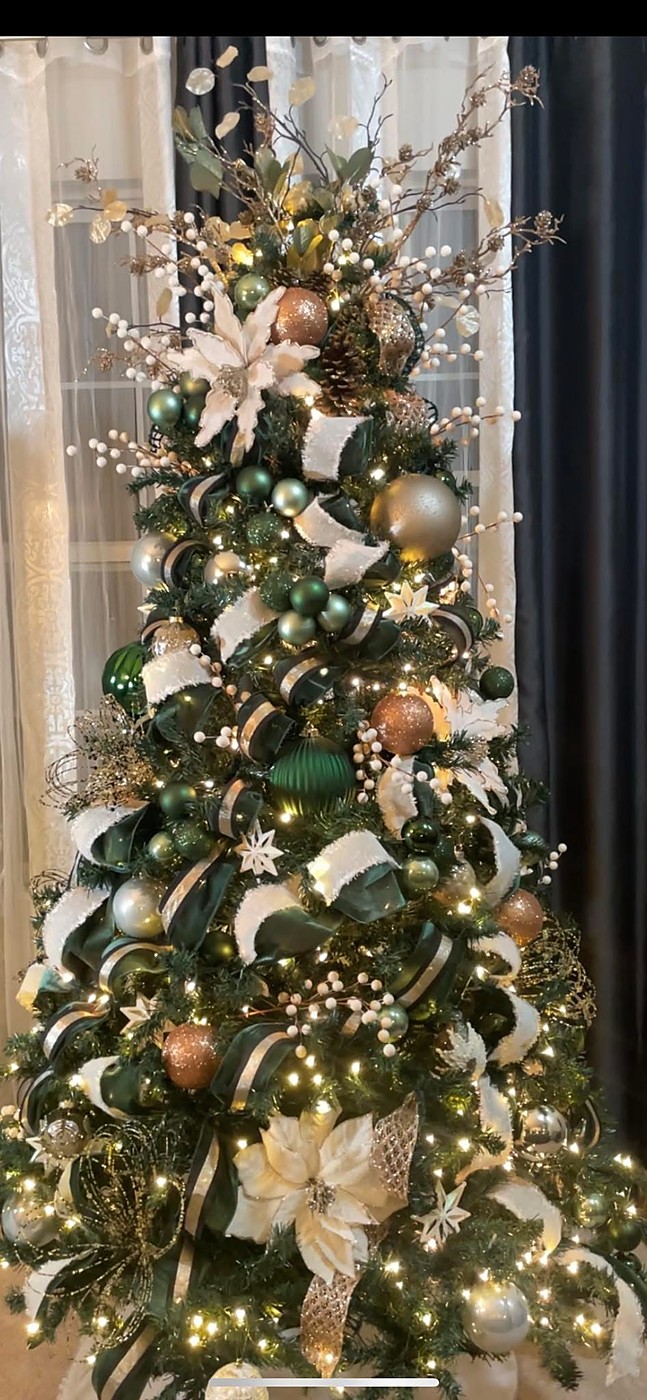 Emerald green Christmas tree with copper and gold ornaments